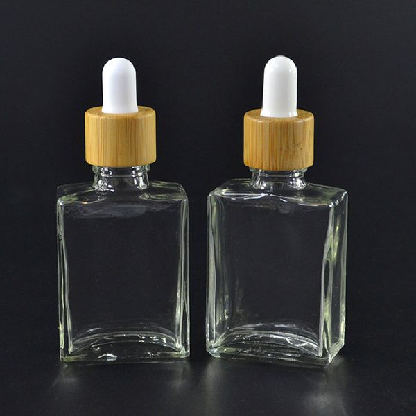 dhgate 15ml 30ml 50ml 100ml clear transparent square glass essential oil bottle with bamboo lid,skin care cosmetic serum dropper bottle ship
dhgate 15ml 30ml 50ml 100ml clear transparent square glass essential oil bottle with bamboo lid,skin care cosmetic serum dropper bottle ship
