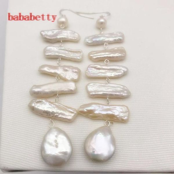 natural freshwater white pearl lute irregular pearl twisted buckle earrings tibetan silver 9 cm long1
natural freshwater white pearl lute irregular pearl twisted buckle earrings tibetan silver 9 cm long1