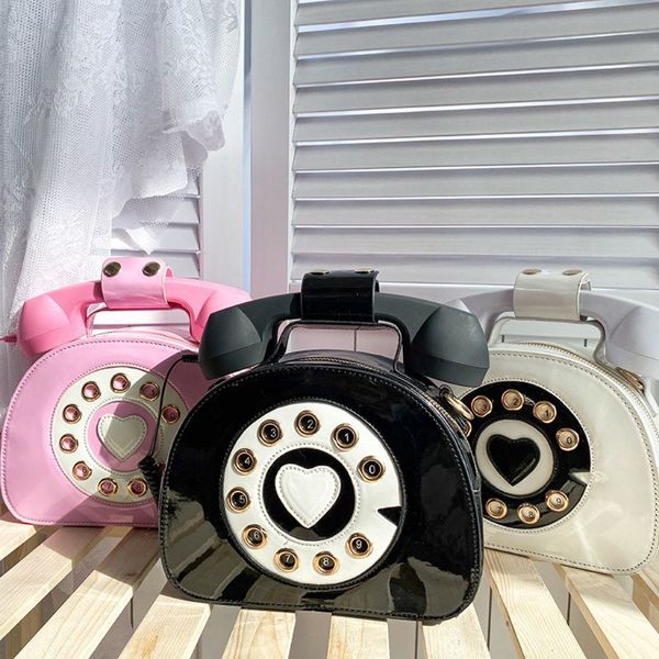 stylish women telephone shaped crossbody pu leather shoulder bag female casual handbag shopping street school satchel tote purse c1009
stylish women telephone shaped crossbody pu leather shoulder bag female casual handbag shopping street school satchel tote purse c1009