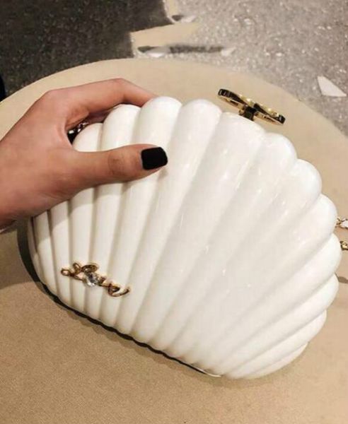 элегантный ivory pearl shell браслет мешок 2020 сцепления кошелек лучший дизайнер сумка плеча роскошный подарок кошелек черный жемчуг оболоч
элегантный ivory pearl shell браслет мешок 2020 сцепления кошелек лучший дизайнер сумка плеча роскошный подарок кошелек черный жемчуг оболоч