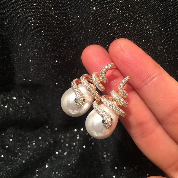 s925 silver needle korean fashion creativity coiling little snake earrings lovely pearl curved snake earrings internet celebrity hipster
s925 silver needle korean fashion creativity coiling little snake earrings lovely pearl curved snake earrings internet celebrity hipster