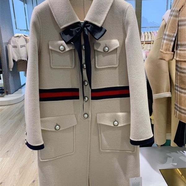 handmade wool coat beige high-end double-sided cashmere coat women's middle long fragrance color matching bow retro woolen coat 201214, Black
handmade wool coat beige high-end double-sided cashmere coat women's middle long fragrance color matching bow retro woolen coat 201214, Black