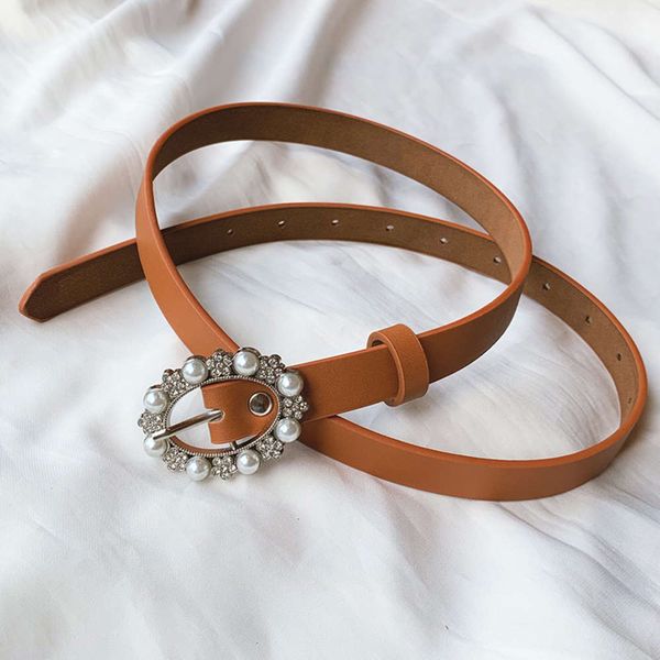 buckle trend oval pin pearl inlaid diamond pu leather thin women's dress jeans versatile belt, Black;brown
buckle trend oval pin pearl inlaid diamond pu leather thin women's dress jeans versatile belt, Black;brown