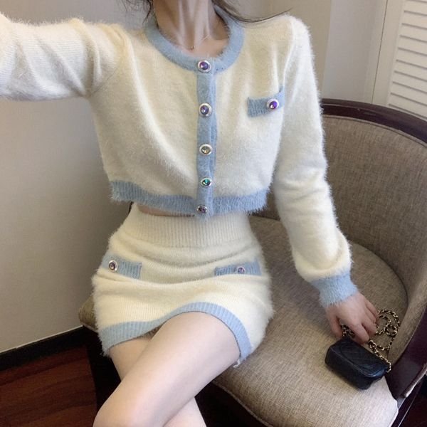 2020 autumn new long sleeve sweater cardigan + hip wrap short skirt fashion knitted two piece women's suit
2020 autumn new long sleeve sweater cardigan + hip wrap short skirt fashion knitted two piece women's suit