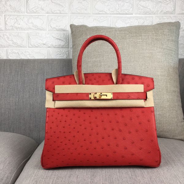 whosale price fully handmade quality red real ostrich skin design handbag30cm wax stitching gold and silver hardware fast delivery
whosale price fully handmade quality red real ostrich skin design handbag30cm wax stitching gold and silver hardware fast delivery