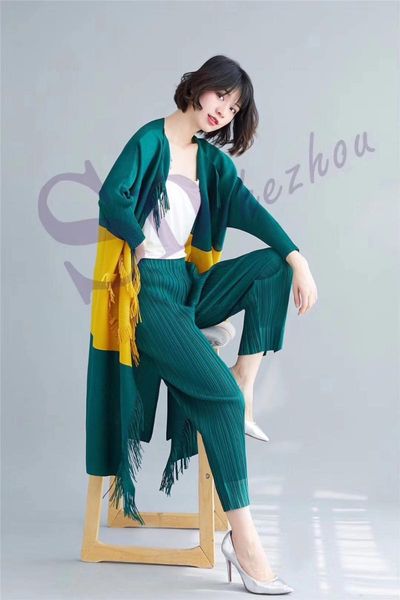 women's trench coats selling startlingly tassel pockets miyake medium-long cardigan patchwork pleated outerwear in stock, Tan;black 
women's trench coats selling startlingly tassel pockets miyake medium-long cardigan patchwork pleated outerwear in stock, Tan;black