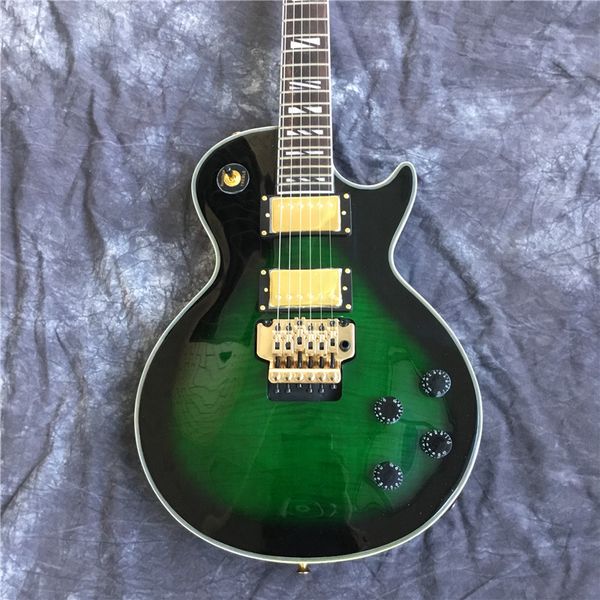 6 string electric guitar, mahogany body with maple veneer, green, gold hardware, gold double rocker, ing
6 string electric guitar, mahogany body with maple veneer, green, gold hardware, gold double rocker, ing