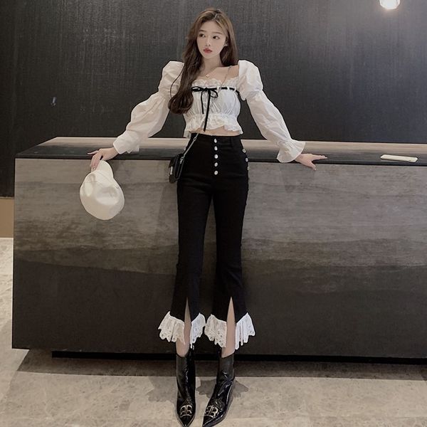two piece women's fashion suit with one line collar and lace stitching shirt + double breasted decorative trousers in autumn
two piece women's fashion suit with one line collar and lace stitching shirt + double breasted decorative trousers in autumn