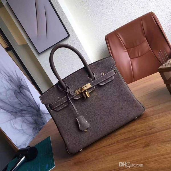new famous brand harmes women designer handbags litchi pattern genuine leather women designer bags fashion totes large capacity designer bag
new famous brand harmes women designer handbags litchi pattern genuine leather women designer bags fashion totes large capacity designer bag