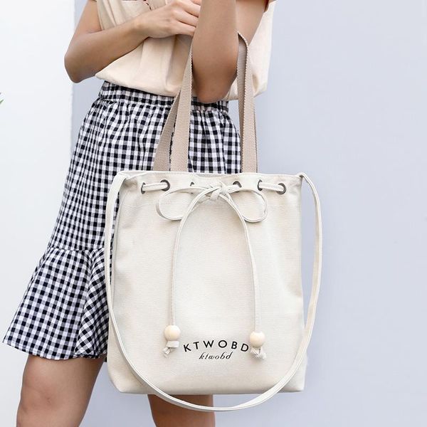 kvky canvas women handbags fashion drawstring handle bags leisure joker women handbags pure color female shoulder bag
kvky canvas women handbags fashion drawstring handle bags leisure joker women handbags pure color female shoulder bag