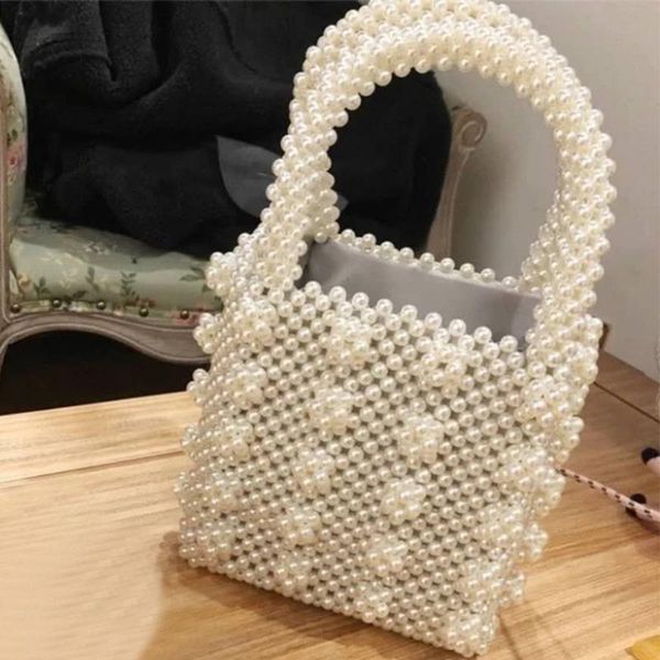2020 new korean version portable fashion pearl bag handmade beaded dinner bag exquisite solid simple elegant stylish all-match
2020 new korean version portable fashion pearl bag handmade beaded dinner bag exquisite solid simple elegant stylish all-match