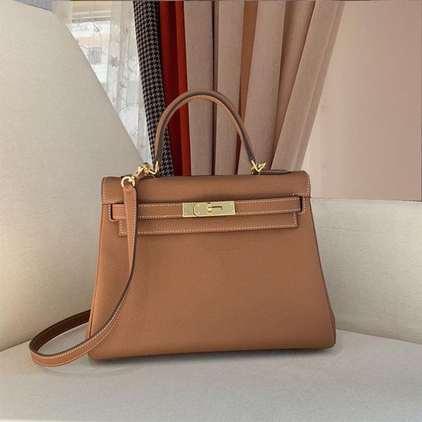 gaoding genuine leather kelly bag layer cowhide kelly bag 25 small litchi pattern gold buckle 28 portable crossbody bag, Black;red
gaoding genuine leather kelly bag layer cowhide kelly bag 25 small litchi pattern gold buckle 28 portable crossbody bag, Black;red
