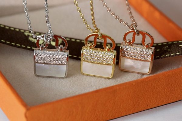 wholesale men women fashion necklace diamond iced out pendant necklace stainless steel bag style h letter designer necklace, Silver
wholesale men women fashion necklace diamond iced out pendant necklace stainless steel bag style h letter designer necklace, Silver