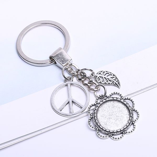 chains setting vintage round cabochon metal jewelry key making tree peace keychain for women, Silver
chains setting vintage round cabochon metal jewelry key making tree peace keychain for women, Silver