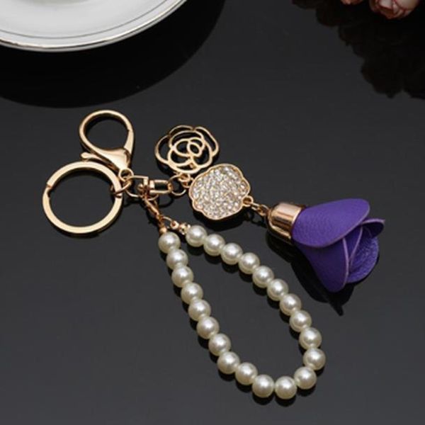 new camellia flower leather keychain bag pendant car ornaments creative gifts long key chain buckle key ring 17 colors eh816 h jllpar
new camellia flower leather keychain bag pendant car ornaments creative gifts long key chain buckle key ring 17 colors eh816 h jllpar