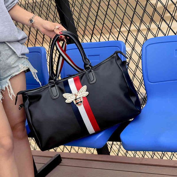 2022 factory wholesale handbag fashion business trip short distance men's and women's hand-held single shoulder diagonal travel lu
2022 factory wholesale handbag fashion business trip short distance men's and women's hand-held single shoulder diagonal travel lu