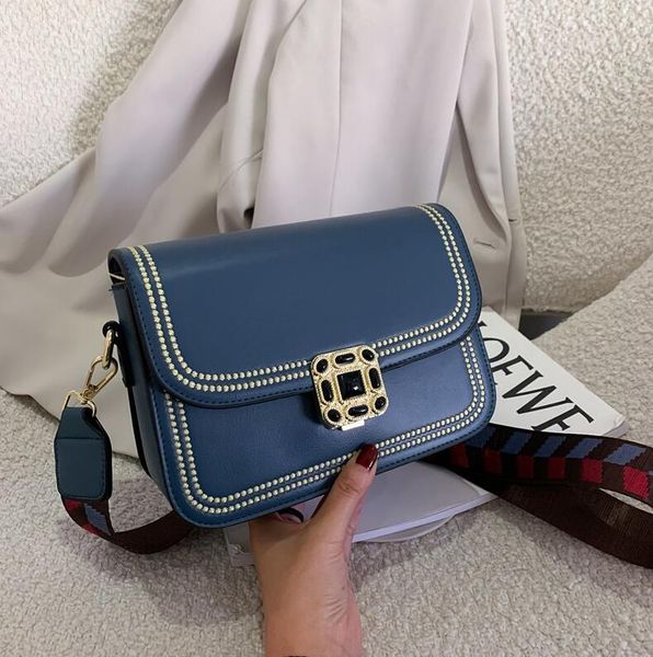 factory wholesale women handbag simple atmosphere embroidery fashion bag trend studded shoulder bag new solid color leather messenger bag
factory wholesale women handbag simple atmosphere embroidery fashion bag trend studded shoulder bag new solid color leather messenger bag