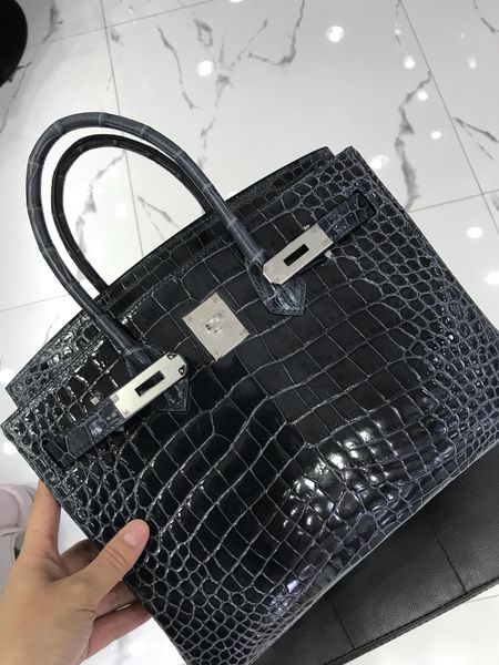 factory wholesale dark grey shinny crocodile handbag 30cm fully handmade wax thread can make other size many colors for chosen fast delivery
factory wholesale dark grey shinny crocodile handbag 30cm fully handmade wax thread can make other size many colors for chosen fast delivery