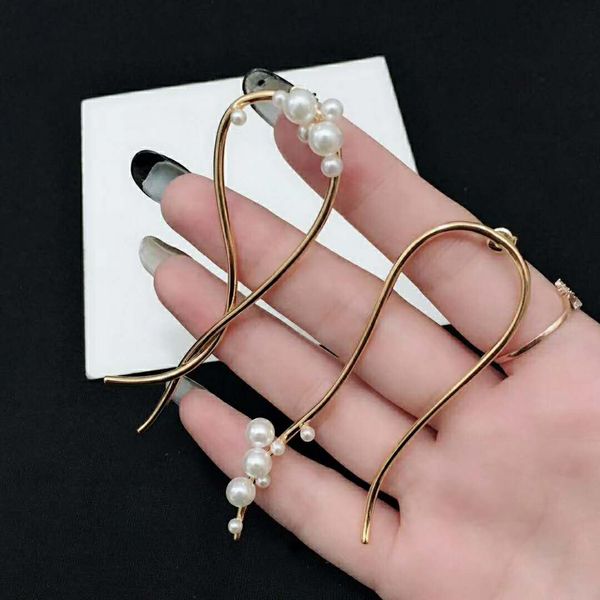 new irregular simple fashion pearl designer earrings luxury designer jewelry women earrings, Golden
new irregular simple fashion pearl designer earrings luxury designer jewelry women earrings, Golden