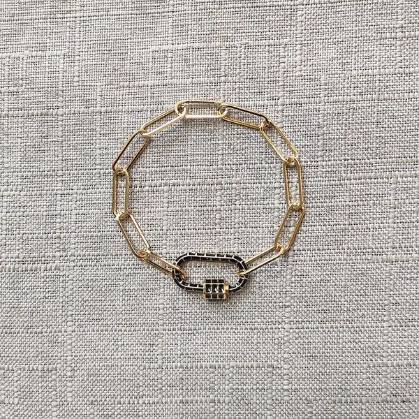 handmade classic spiral buckle pendant bracelet man punk chain jewelry black white blue carabiner can be opened bangle for women1, Golden;silver
handmade classic spiral buckle pendant bracelet man punk chain jewelry black white blue carabiner can be opened bangle for women1, Golden;silver