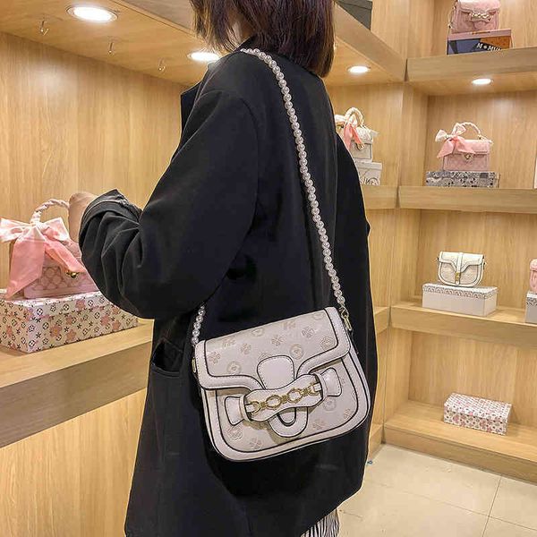 2022 latest handbag factory store sweet embossed single shoulder feminine simple pearl chain portable bag small square
2022 latest handbag factory store sweet embossed single shoulder feminine simple pearl chain portable bag small square
