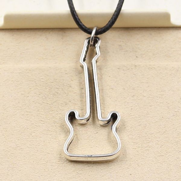 tibetan silver color pendant hollow guitar necklace choker charm black leather cord factory price handmade jewelry r0sx
tibetan silver color pendant hollow guitar necklace choker charm black leather cord factory price handmade jewelry r0sx