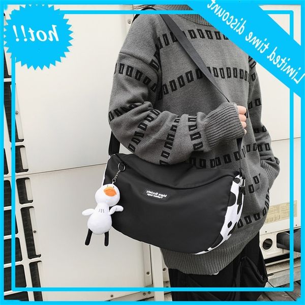 solid color men's and women's fashion messenger trend youth black nylon cloth postman college student couple's shoulder bag
solid color men's and women's fashion messenger trend youth black nylon cloth postman college student couple's shoulder bag