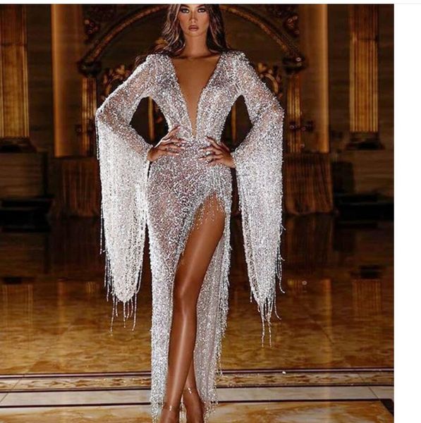 2020 european and american fashion autumn new women's tassel deep v perspective dress, Black;gray
2020 european and american fashion autumn new women's tassel deep v perspective dress, Black;gray