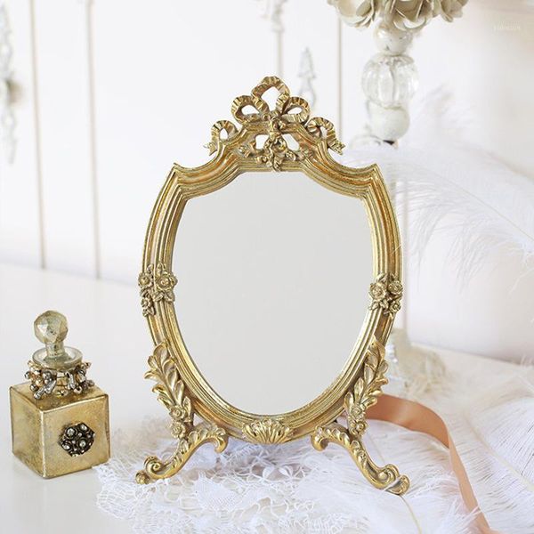 european retro carved golden makeup mirror shooting props can be placed or hung creative classical bedroom dressing mirror1
european retro carved golden makeup mirror shooting props can be placed or hung creative classical bedroom dressing mirror1