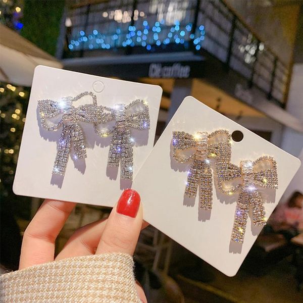 stud gorgeous bow earrings tassel rhinestone crystal hollow shining long for women fashion dangler jewelry wedding, Golden;silver
stud gorgeous bow earrings tassel rhinestone crystal hollow shining long for women fashion dangler jewelry wedding, Golden;silver
