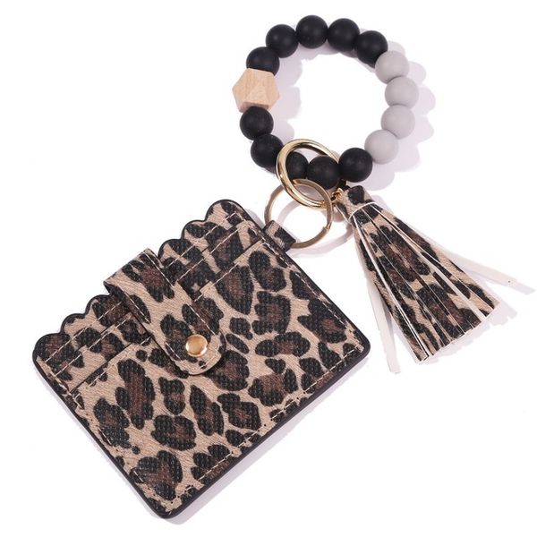 fashion pu leather bracelet wallet keychain party favor tassels bangle key ring holder card bag silicone beaded wristlet keychains handbag f
fashion pu leather bracelet wallet keychain party favor tassels bangle key ring holder card bag silicone beaded wristlet keychains handbag f