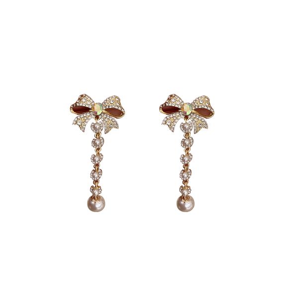 925 silver needle full diamond bowknot pearl tassel long wind earrings temperament trendy fashion earrings
925 silver needle full diamond bowknot pearl tassel long wind earrings temperament trendy fashion earrings