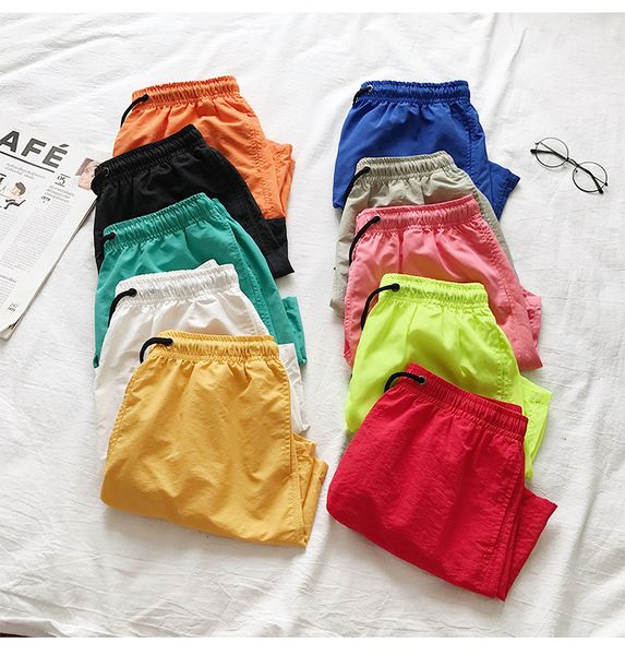 2020 summer beach candy color quick drying pants men's breathable sports casual shorts, White;black
2020 summer beach candy color quick drying pants men's breathable sports casual shorts, White;black