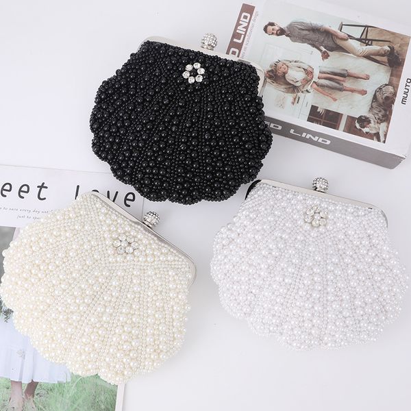2023 new fashion hand-held pearl bucket bag shell dinner handmade lady's evening bag
2023 new fashion hand-held pearl bucket bag shell dinner handmade lady's evening bag