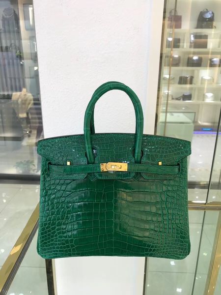 wholesale price shinny green crocodile skin 25cm fully handmade wax line stitching 2-3days to make after payment
wholesale price shinny green crocodile skin 25cm fully handmade wax line stitching 2-3days to make after payment