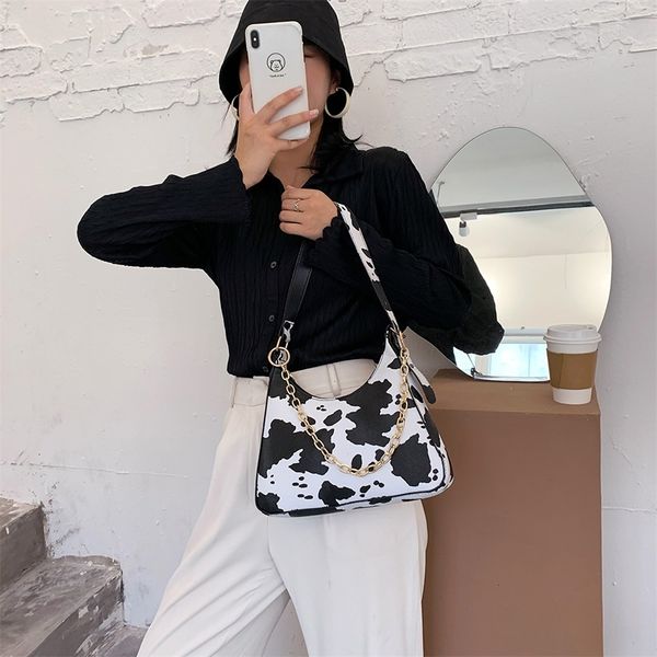 milk cow print women's bag fashion women handbags baguette shape female shoulder bag underarm women bag 2020 hobos clucth purses 
milk cow print women's bag fashion women handbags baguette shape female shoulder bag underarm women bag 2020 hobos clucth purses