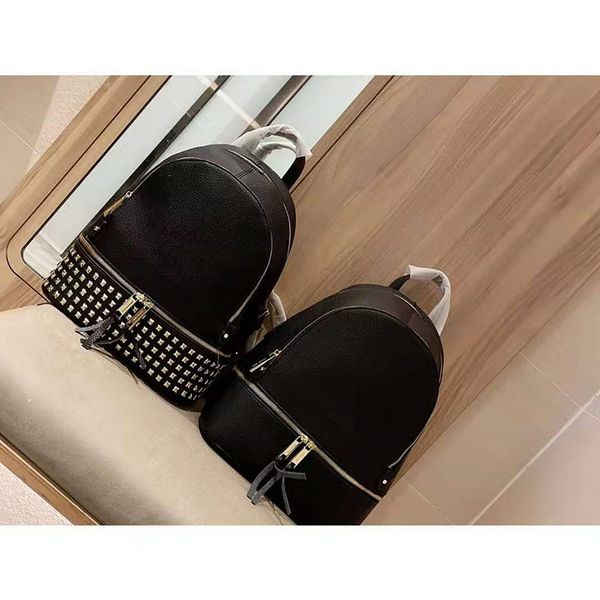 the new 2020 girls women backpack style fashion rivet soft leather schoolbag joker travel bag handbag backpacks 
the new 2020 girls women backpack style fashion rivet soft leather schoolbag joker travel bag handbag backpacks