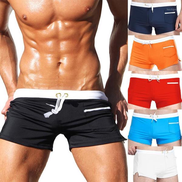 2020new arrival summer manly style drawstring water briefs with front zipper pocket quickly dry elastic fitness beach trunks1, White;black 
2020new arrival summer manly style drawstring water briefs with front zipper pocket quickly dry elastic fitness beach trunks1, White;black