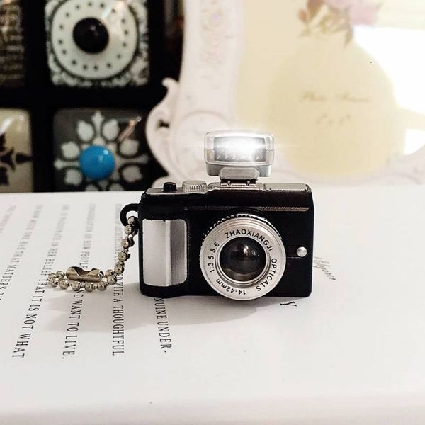 retro camera keychain with led light vocal car mobile phone bag pendant, Silver
retro camera keychain with led light vocal car mobile phone bag pendant, Silver