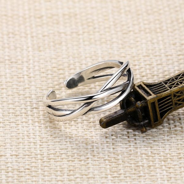 925 sterling silver cross opening ring cold wind simple personality twist knitting index finger ring children's fashion
925 sterling silver cross opening ring cold wind simple personality twist knitting index finger ring children's fashion