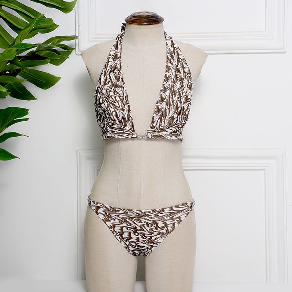 fashion d family letter print neck hanging bikini women's rhinestone button brand light luxury swimsuit
fashion d family letter print neck hanging bikini women's rhinestone button brand light luxury swimsuit