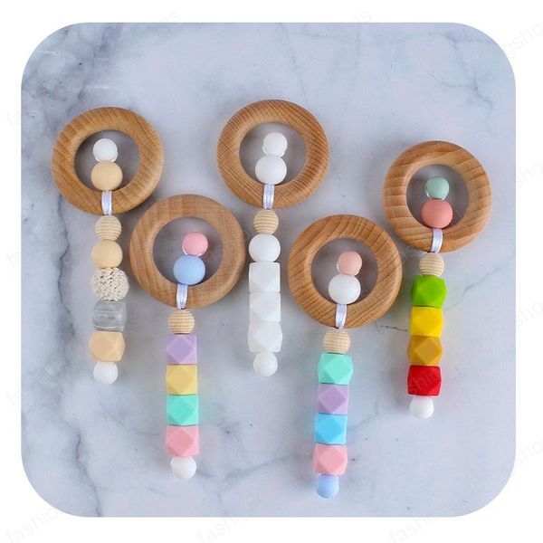 10 colors new diy cartoon wood circle hand stick toy teether baby silicone bead teething stick
10 colors new diy cartoon wood circle hand stick toy teether baby silicone bead teething stick