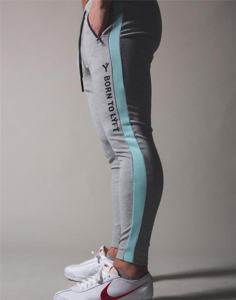 new gym training fitness pants men women stitching fashion running pencil pants trendy brand feet, Black
new gym training fitness pants men women stitching fashion running pencil pants trendy brand feet, Black