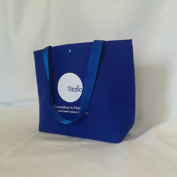 100pcs/lot blue felt gift wrap bags christmas reusable packaging with cotton handles custom printed logo euro shopper1
100pcs/lot blue felt gift wrap bags christmas reusable packaging with cotton handles custom printed logo euro shopper1