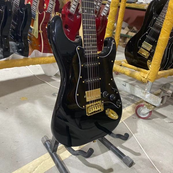 st electric guitar black color golden hardware rosewood fingerboard guitarar
st electric guitar black color golden hardware rosewood fingerboard guitarar