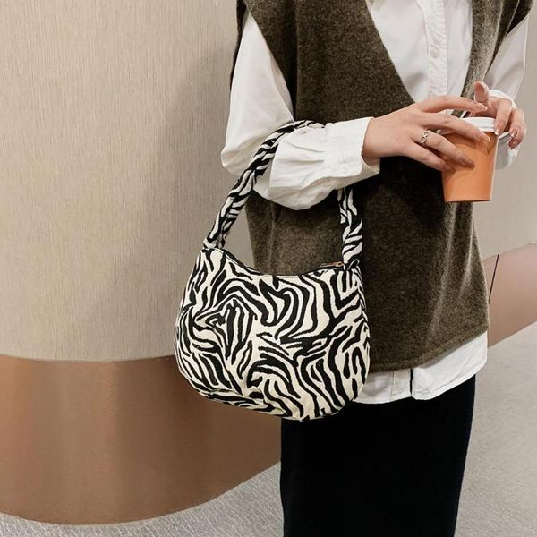 shoulder bags 2021 retro women bag canvas zebra print female messenger ladies casual zipper sac main femme
shoulder bags 2021 retro women bag canvas zebra print female messenger ladies casual zipper sac main femme