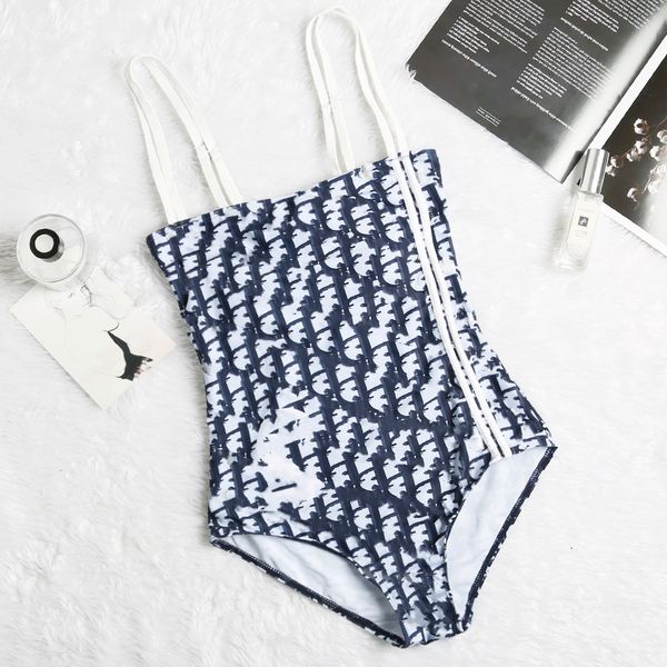fashion women's sense open back triangle one piece navy blue d letter printed swimsuit
fashion women's sense open back triangle one piece navy blue d letter printed swimsuit
