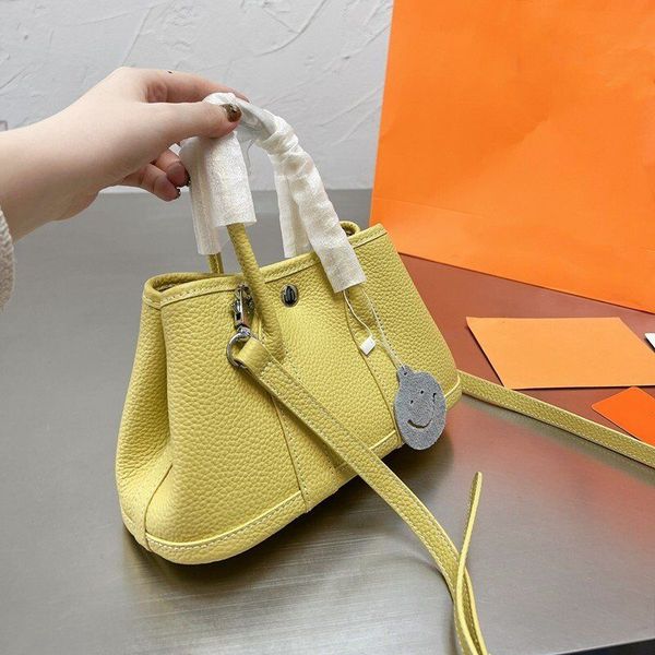 fashion bag garden party tote bag handbag women famous brands cow leather shoulder delivery
fashion bag garden party tote bag handbag women famous brands cow leather shoulder delivery
