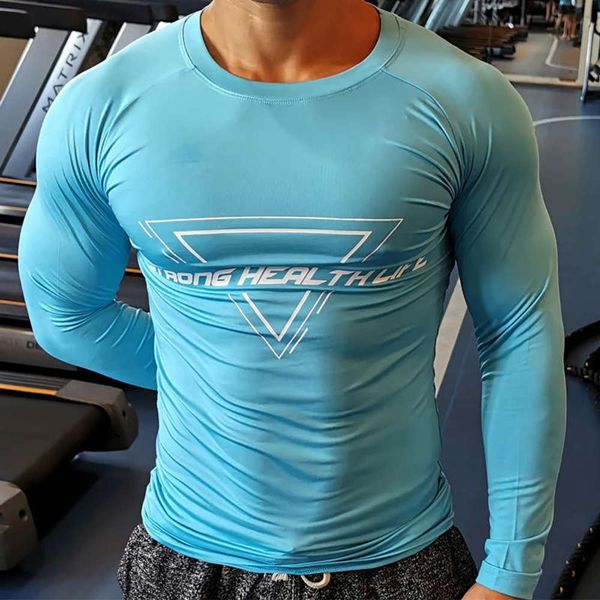 drying sleeve quick fitness muscle long men's tights running sportswear iron training clothes elastic t-shirt backing, Gray 
drying sleeve quick fitness muscle long men's tights running sportswear iron training clothes elastic t-shirt backing, Gray