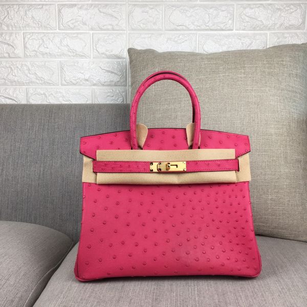 whosale fully handmade quality,fuchsia real ostrich skin,design handbag30cm, wax stitching,gold and silver hardware,message me for discount
whosale fully handmade quality,fuchsia real ostrich skin,design handbag30cm, wax stitching,gold and silver hardware,message me for discount